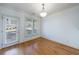 Dining area featuring hardwood floors and patio access at 970 Samples Nw Ln, Atlanta, GA 30318