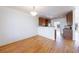 Open concept dining area with hardwood floors and kitchen views at 970 Samples Nw Ln, Atlanta, GA 30318