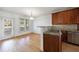 Bright dining area with hardwood floors and access to backyard at 970 Samples Nw Ln, Atlanta, GA 30318