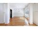 Elegant dining room with hardwood floors, chandelier, and wainscoting at 970 Samples Nw Ln, Atlanta, GA 30318