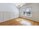 Formal dining room featuring hardwood floors, chandelier and large window at 970 Samples Nw Ln, Atlanta, GA 30318
