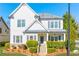 Two-story house with gray accents and landscaped yard at 970 Samples Nw Ln, Atlanta, GA 30318