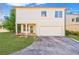 Two-story house with attached garage and manicured lawn at 970 Samples Nw Ln, Atlanta, GA 30318
