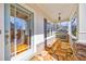 Stone porch with light blue door and white columns at 970 Samples Nw Ln, Atlanta, GA 30318