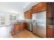 Updated kitchen, featuring stainless steel appliances and granite countertops at 970 Samples Nw Ln, Atlanta, GA 30318