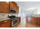 Well-equipped kitchen with stainless steel appliances and granite countertops at 970 Samples Nw Ln, Atlanta, GA 30318