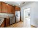 Updated kitchen featuring stainless steel appliances and granite countertops at 970 Samples Nw Ln, Atlanta, GA 30318