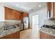 Modern kitchen with stainless steel appliances and granite countertops at 970 Samples Nw Ln, Atlanta, GA 30318