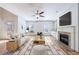 Spacious living room with fireplace and built-in shelving at 970 Samples Nw Ln, Atlanta, GA 30318