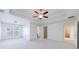Spacious main bedroom with tray ceiling and fan at 970 Samples Nw Ln, Atlanta, GA 30318