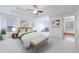 Large bedroom with plush carpet and sitting area at 970 Samples Nw Ln, Atlanta, GA 30318