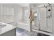Clean bathroom featuring a shower and bathtub at 2732 Piper Dr, Atlanta, GA 30331