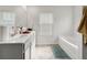 Modern bathroom with double vanity and relaxing bathtub at 2732 Piper Dr, Atlanta, GA 30331