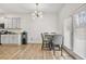 Kitchen dining area with table and chairs, and access to backyard at 2732 Piper Dr, Atlanta, GA 30331
