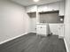 Finished basement kitchenette with white cabinets at 1394 Yates Ave, Austell, GA 30106