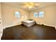 Well-lit bedroom featuring dark hardwood floors at 1394 Yates Ave, Austell, GA 30106
