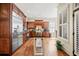Spacious kitchen with stainless appliances, custom cabinets, and lots of natural light at 4595 Carriage Walk Ln, Cumming, GA 30040
