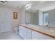 Bathroom with double vanity and wood cabinets at 954 Josie Ct, Lawrenceville, GA 30045