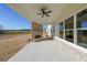 Covered patio with fireplace and view of the backyard at 5450 Crow Dr, Cumming, GA 30041