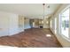 Bright dining area with hardwood floors and access to the back patio at 5450 Crow Dr, Cumming, GA 30041