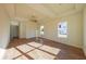 Large main bedroom with hardwood floors and high ceilings at 5450 Crow Dr, Cumming, GA 30041