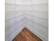 Walk-in pantry with wire shelving for ample storage at 5450 Crow Dr, Cumming, GA 30041
