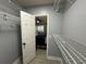 Walk-in closet with wire shelving and access to bedroom at 807 Lismore Se, Smyrna, GA 30080