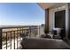 Private balcony with city views and seating area at 1820 Peachtree Nw St # 1005, Atlanta, GA 30309