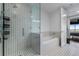 Spa-like bathroom with a walk-in shower and soaking tub at 1820 Peachtree Nw St # 1005, Atlanta, GA 30309