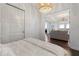 Bedroom with access to living room and city views at 1820 Peachtree Nw St # 1005, Atlanta, GA 30309