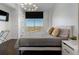 King-size bed, city view, and modern decor in this bedroom at 1820 Peachtree Nw St # 1005, Atlanta, GA 30309
