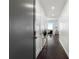 Bright entryway with hardwood floors and modern door at 1820 Peachtree Nw St # 1005, Atlanta, GA 30309