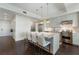 Modern kitchen with island, stainless steel appliances, and white cabinets at 1820 Peachtree Nw St # 1005, Atlanta, GA 30309