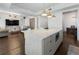 Modern kitchen island with quartz countertop, and open layout at 1820 Peachtree Nw St # 1005, Atlanta, GA 30309