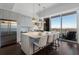 Modern kitchen with stainless steel appliances and breakfast bar at 1820 Peachtree Nw St # 1005, Atlanta, GA 30309