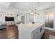Modern kitchen with island, quartz countertop, and open layout at 1820 Peachtree Nw St # 1005, Atlanta, GA 30309