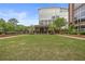 Expansive green lawn with a charming brick pavilion at 1820 Peachtree Nw St # 1005, Atlanta, GA 30309