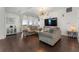Open living room with hardwood floors and modern decor at 1820 Peachtree Nw St # 1005, Atlanta, GA 30309