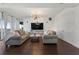 Spacious living room with hardwood floors and modern chandelier at 1820 Peachtree Nw St # 1005, Atlanta, GA 30309