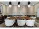 Modern meeting room with large table and chairs at 1820 Peachtree Nw St # 1005, Atlanta, GA 30309