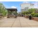 Community patio with grills, tables and seating at 1820 Peachtree Nw St # 1005, Atlanta, GA 30309
