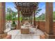 Relaxing pergola with seating overlooking the pool at 1820 Peachtree Nw St # 1005, Atlanta, GA 30309