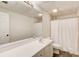 Clean basement bathroom with white vanity and shower/tub combo at 1119 Roxboro Pointe Ne, Atlanta, GA 30324