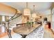 Spacious dining room with large wood table and built-in bench seating at 1119 Roxboro Pointe Ne, Atlanta, GA 30324