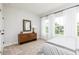 Bedroom with a dresser, large windows and neutral decor at 2654 Brookview Nw Ln, Atlanta, GA 30318