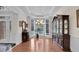 Spacious dining room with hardwood floors and bay windows at 8225 Seven Oaks Dr, Jonesboro, GA 30236