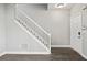 View of the front door, staircase and hardwood flooring at 110 Bowen Sw Cir, Atlanta, GA 30315
