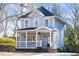 Charming two-story home with a welcoming front porch and a well-maintained yard at 110 Bowen Sw Cir, Atlanta, GA 30315