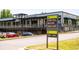 Exterior view of commercial property with sign showing direction to food hall, beltline, and great lawn at 110 Bowen Sw Cir, Atlanta, GA 30315