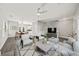Bright living room with modern decor, a ceiling fan, and an open layout at 110 Bowen Sw Cir, Atlanta, GA 30315